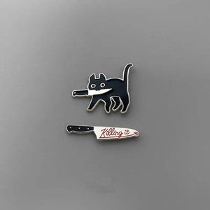 Small knife cat brooch